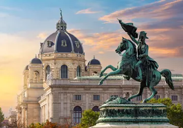 statue of archduke charles on heldenplatz square and museum of natural history dome at sunset vienna austria